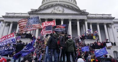 Estadounidenses protestan en Lisboa contra el “criminal” Donald Trump