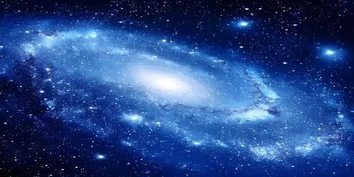 cosmic wonder a swirling blue galaxy in deep space photo