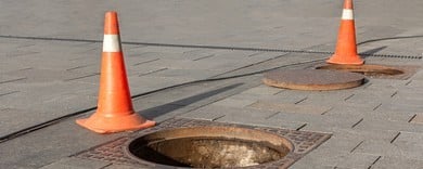 manhole cover open street repair 260nw 1882570543 1