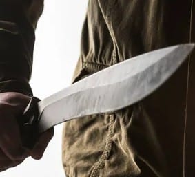 depositphotos 446964230 stock photo man holding machete his threatening 1