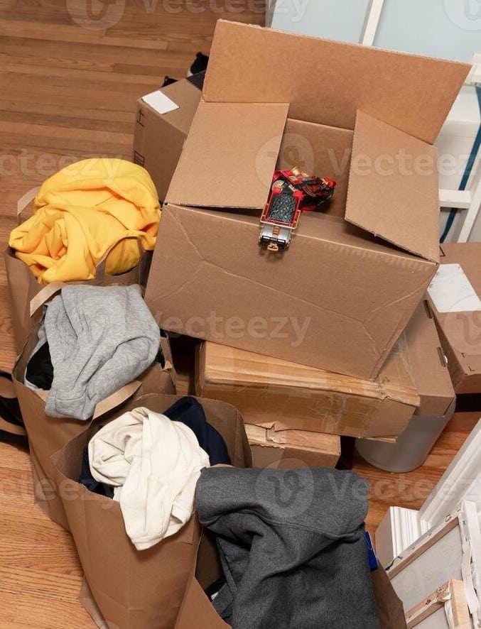 cardboard-boxes-with-clothes-shoes-on-the-floor-things-and-stuff-for-moving-photo (1) cardboard-boxes-with-clothes-shoes-on-the-floor-things-and-stuff-for-moving-photo (1)